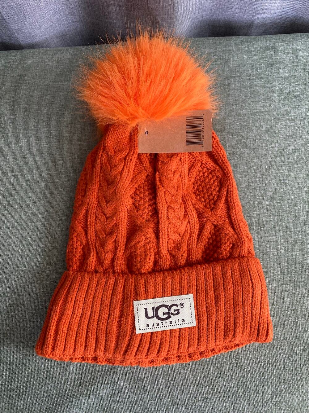 NWT UGG Australia Orange Cable Knit Beanie Hat Fluffy Faux Fur Pom Fleece Lined